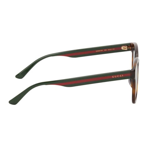 Gucci: Tortoiseshell GG0847SK Sunglasses .